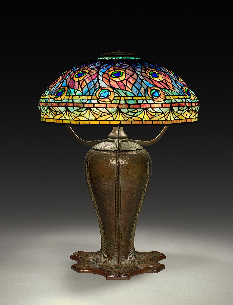 Peacock table lamp by Clara Driscoll for Tiffany Studios, about 1902